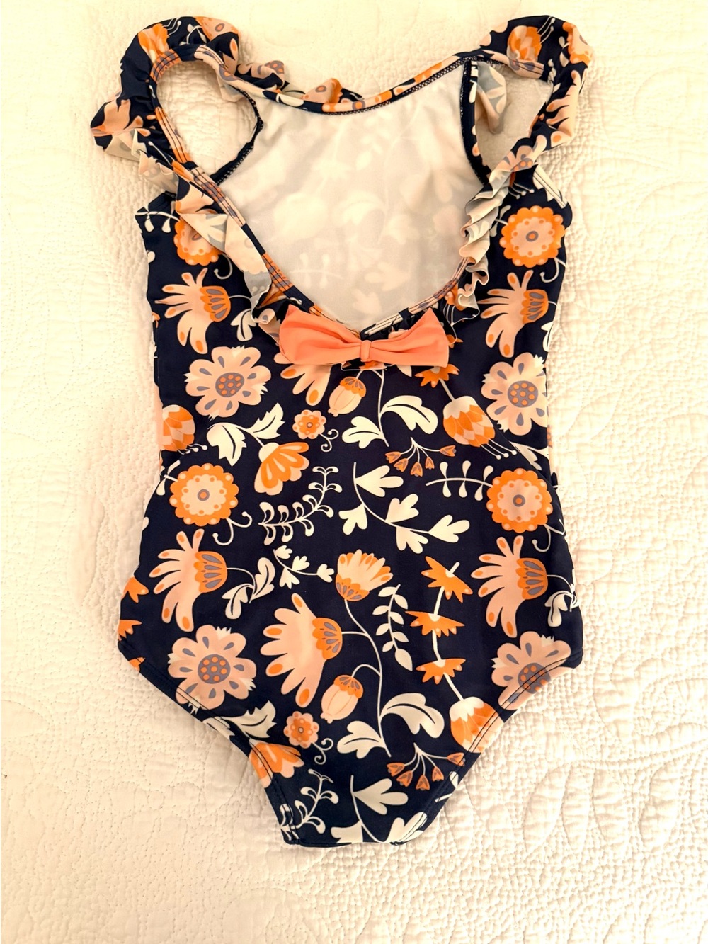 Ruffle Butts Navy Floral One-Piece with Peach Bow size 7 small, S like new!